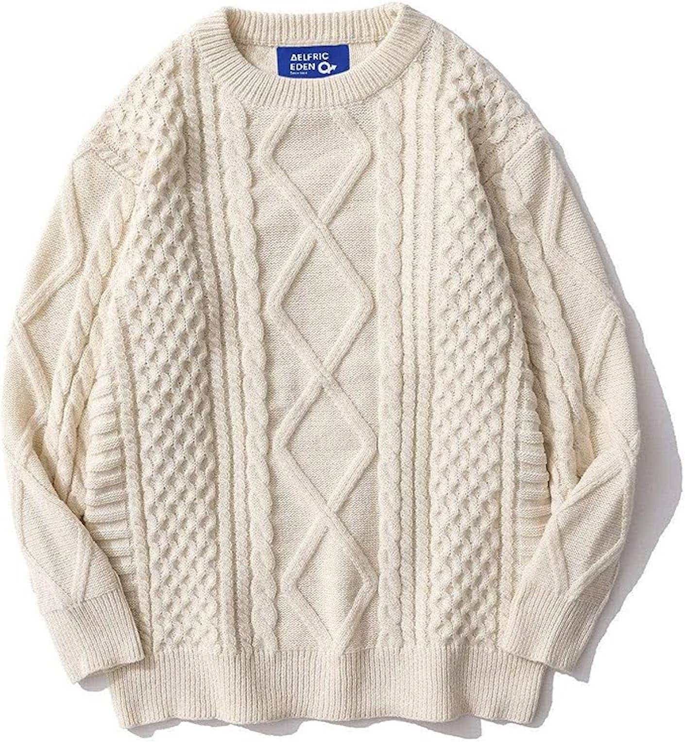 A cream cable knit sweater