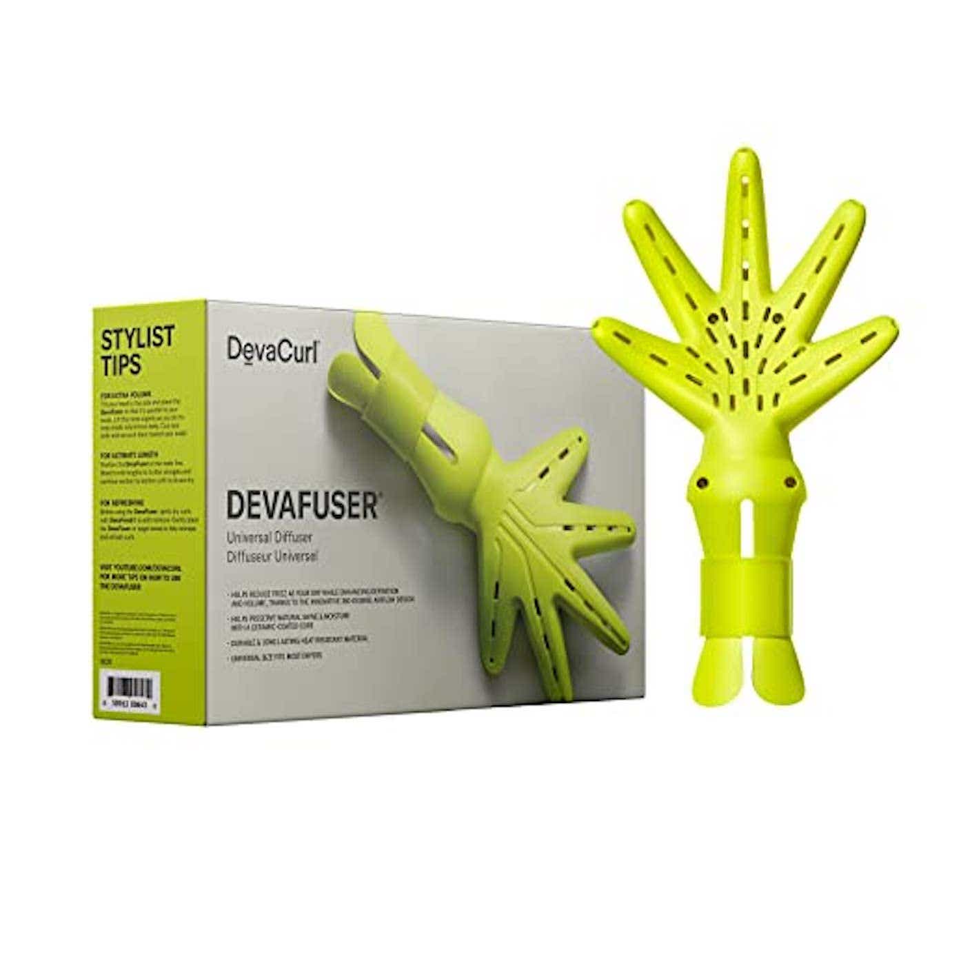 A bright green, diffusing hair dryer attachment shaped like a hand sits next to its packaging.