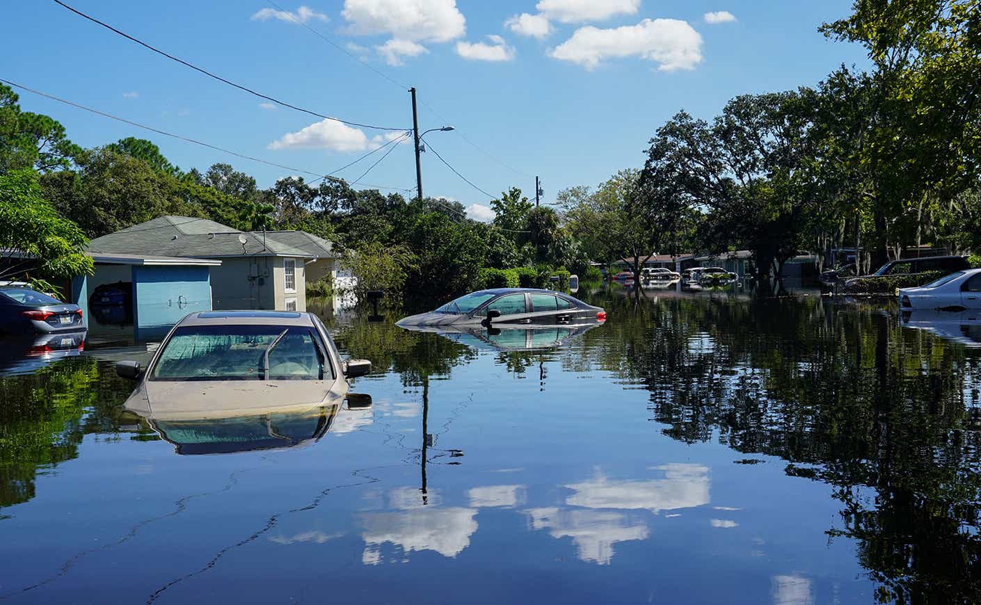 Aftermath of Hurricane Ian shows cars submerged in water