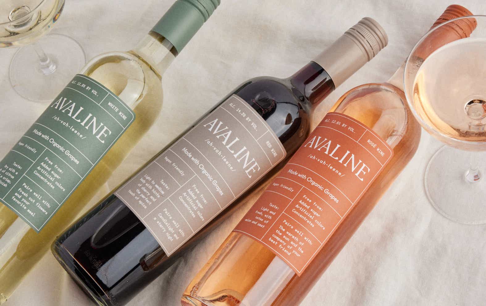 3 bottles of Avaline wine lying on a table
