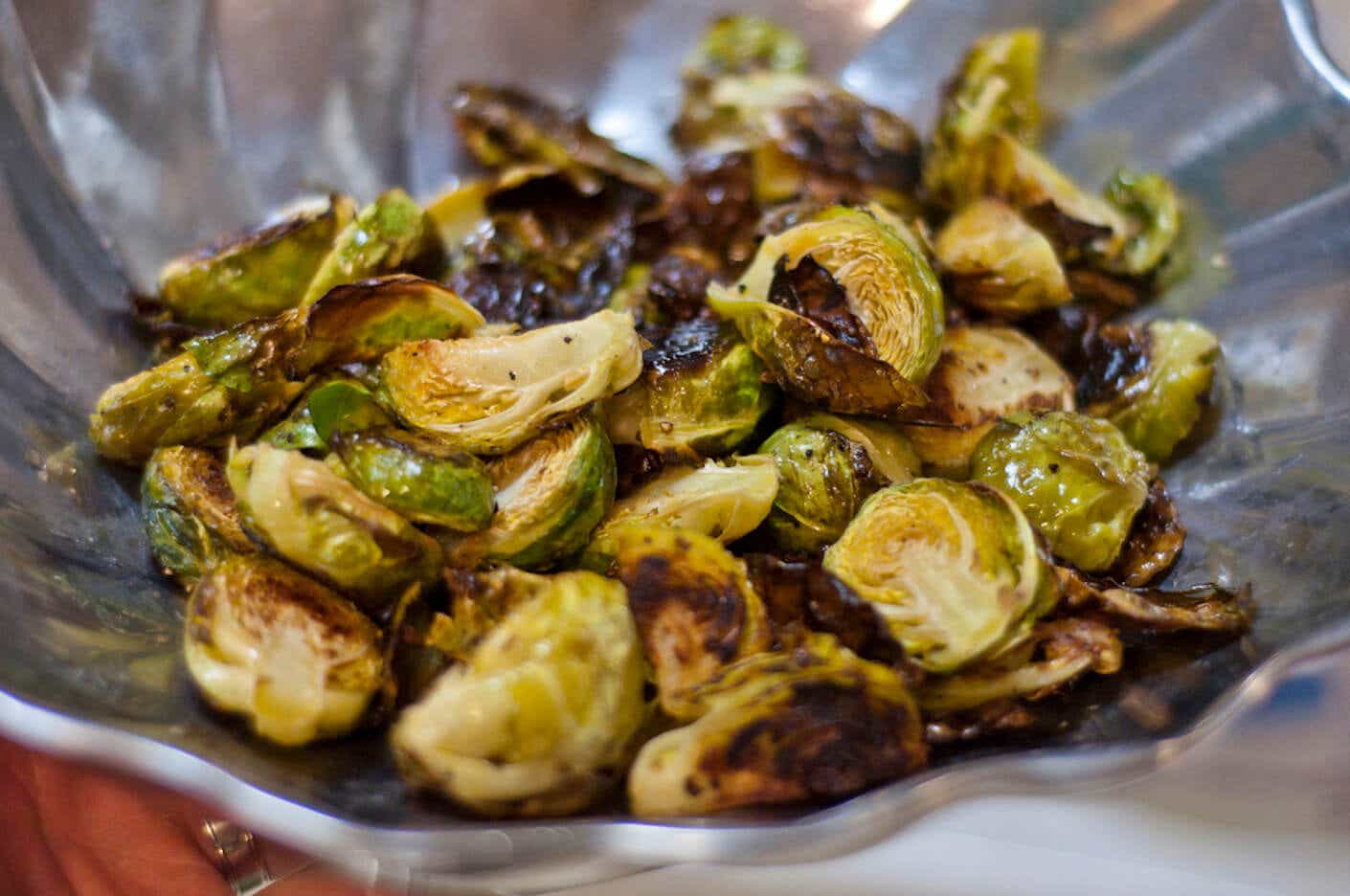 A bowl of roasted Brussels sprouts served as a side dish.