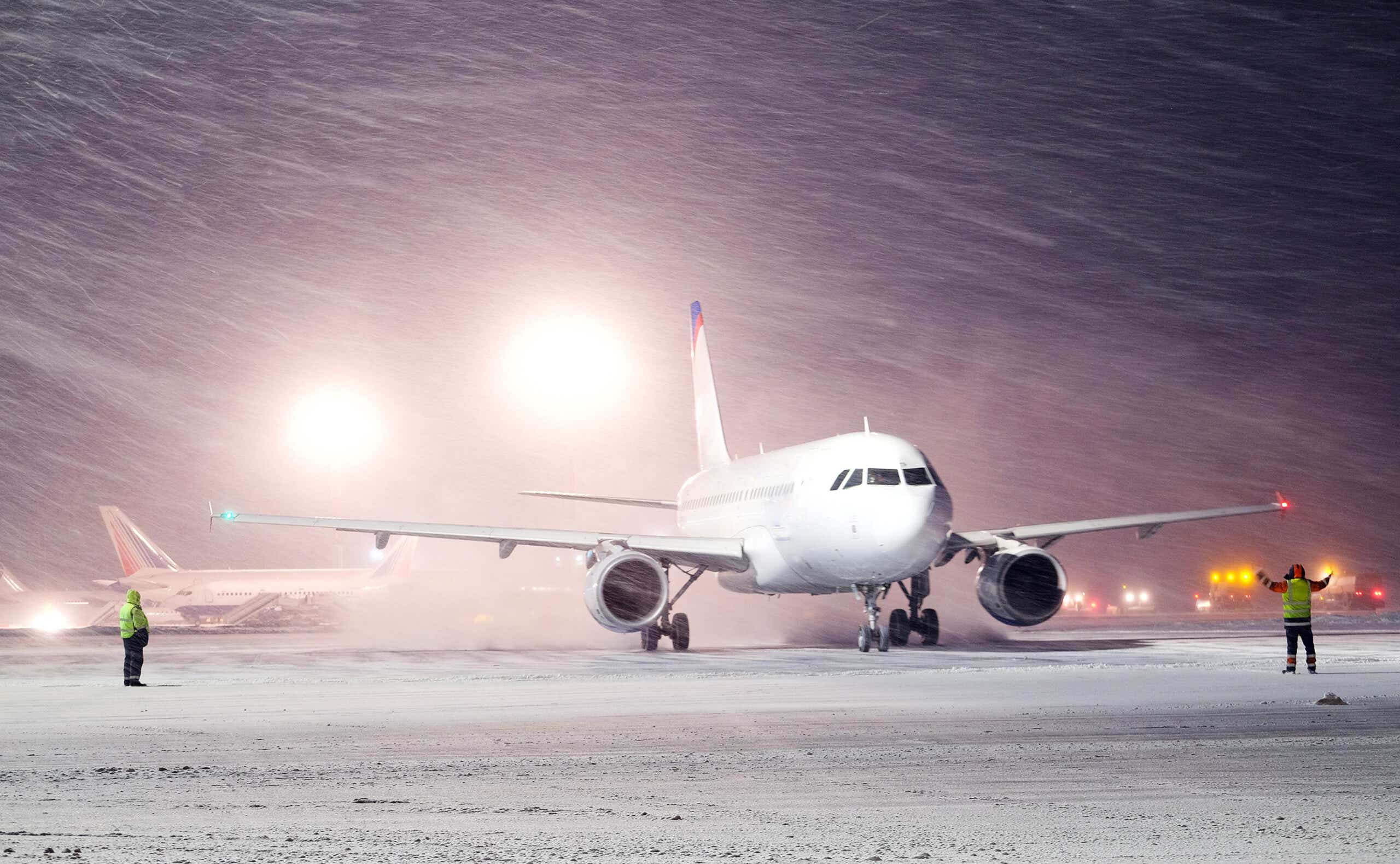 winter storm on plane runway