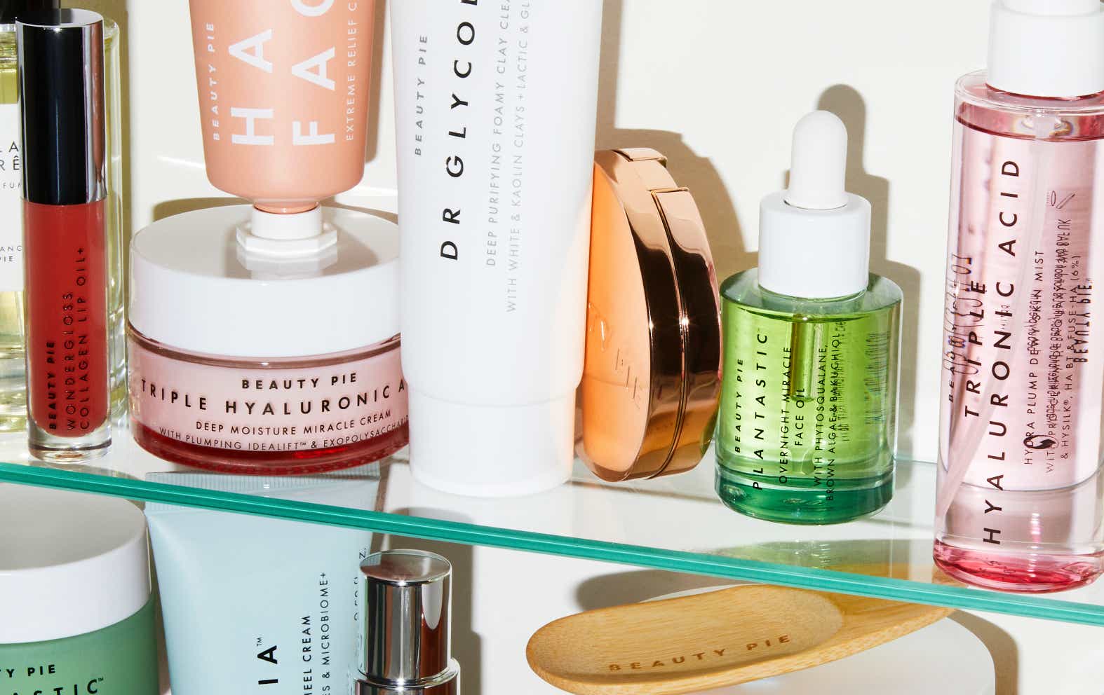 Beauty Pie products on a medicine cabinet shelf