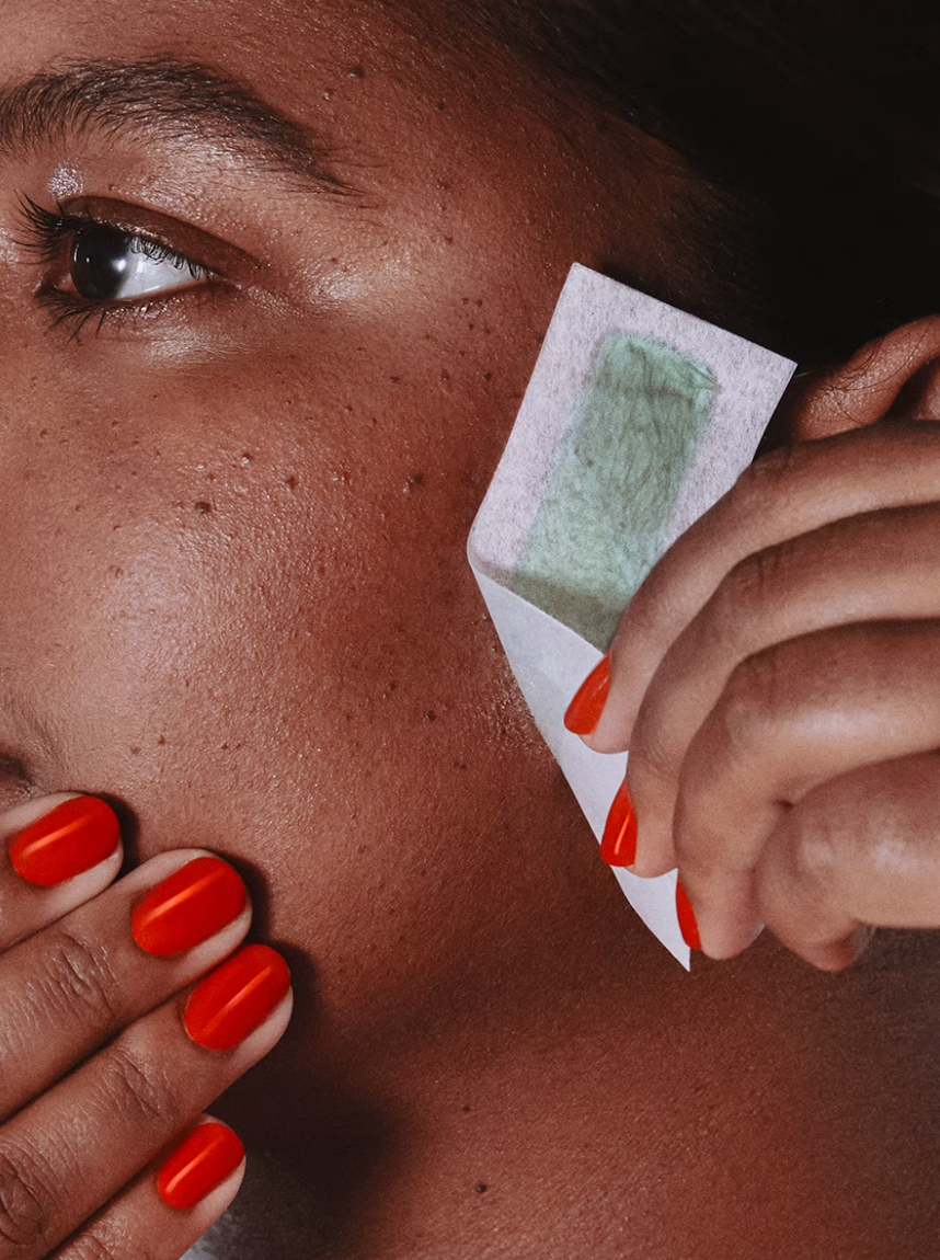 woman waxing her sideburn