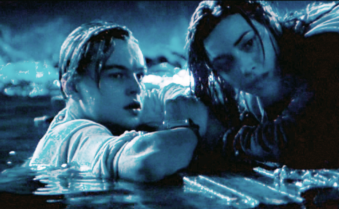 A still from Titanic showing Jack and Rose in the water