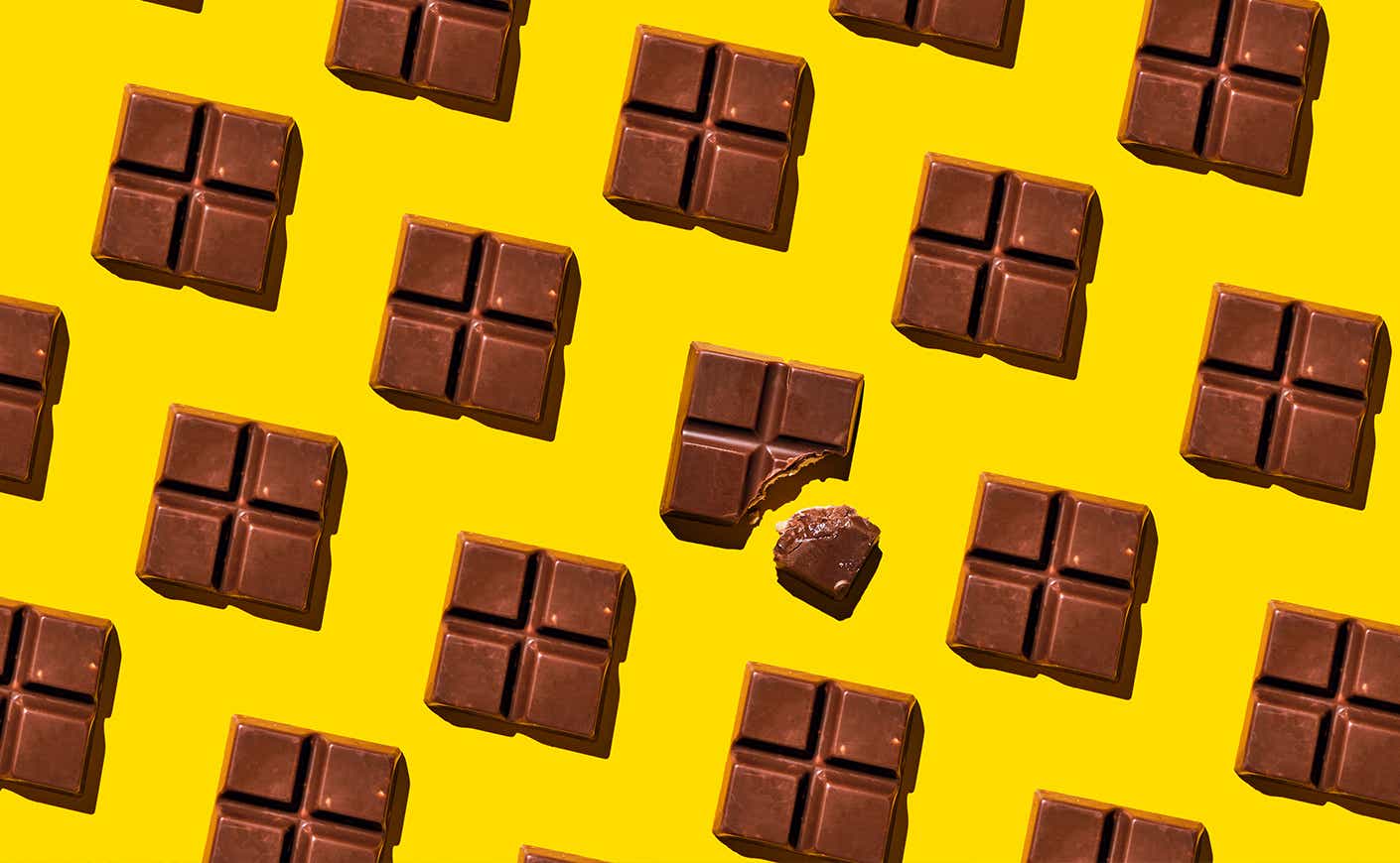 squares of chocolate on a yellow background