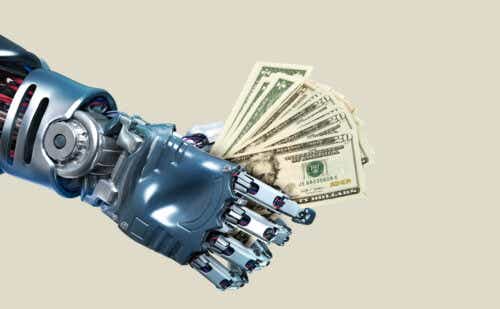 a robot holding money in its hand