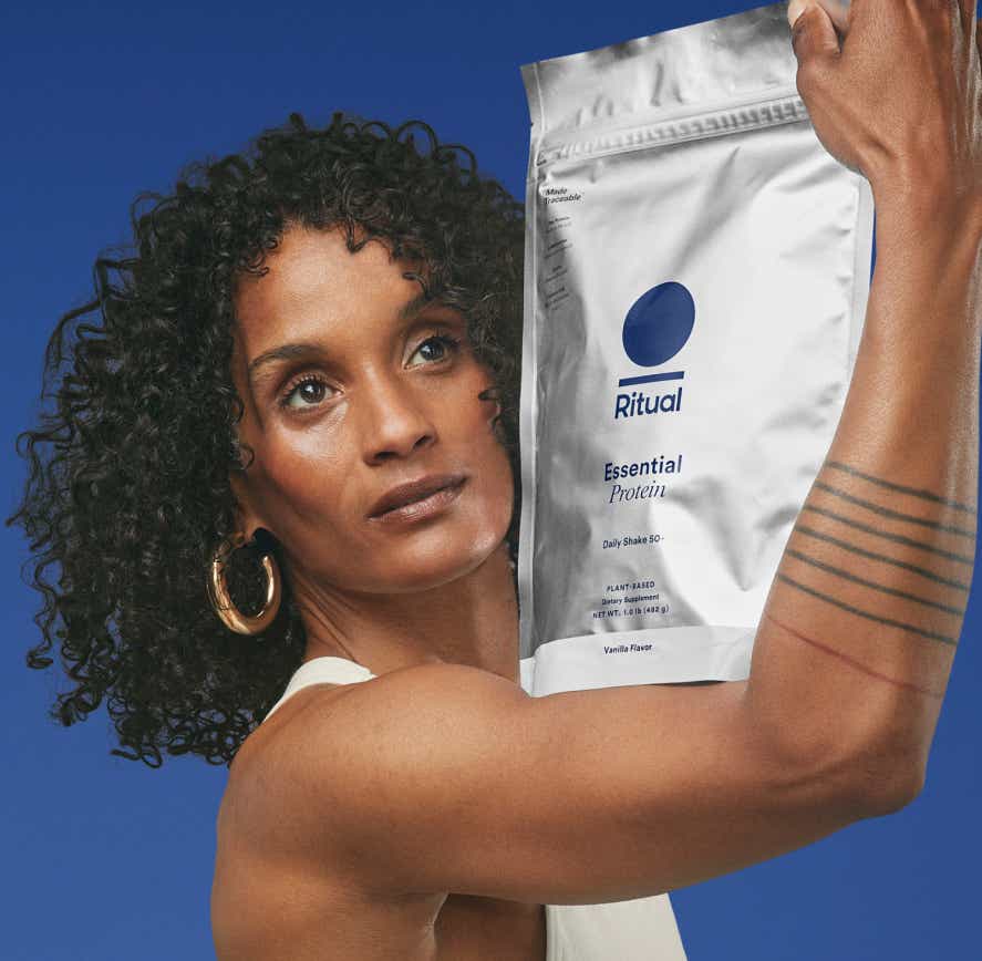 woman holding Ritual's Protein 50+