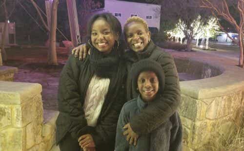 Jemimah Ngari smiles with her two children.