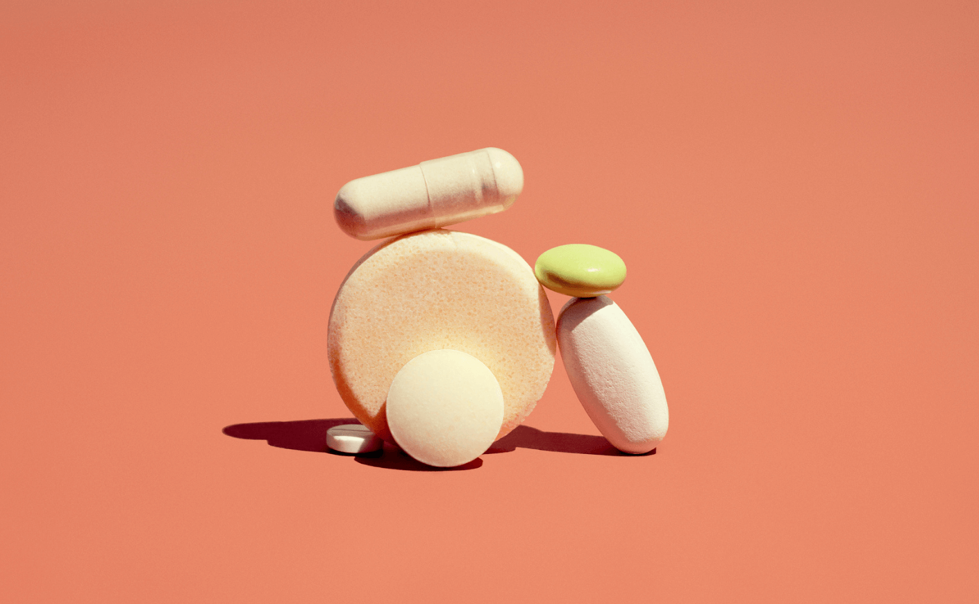 pills on a pink background