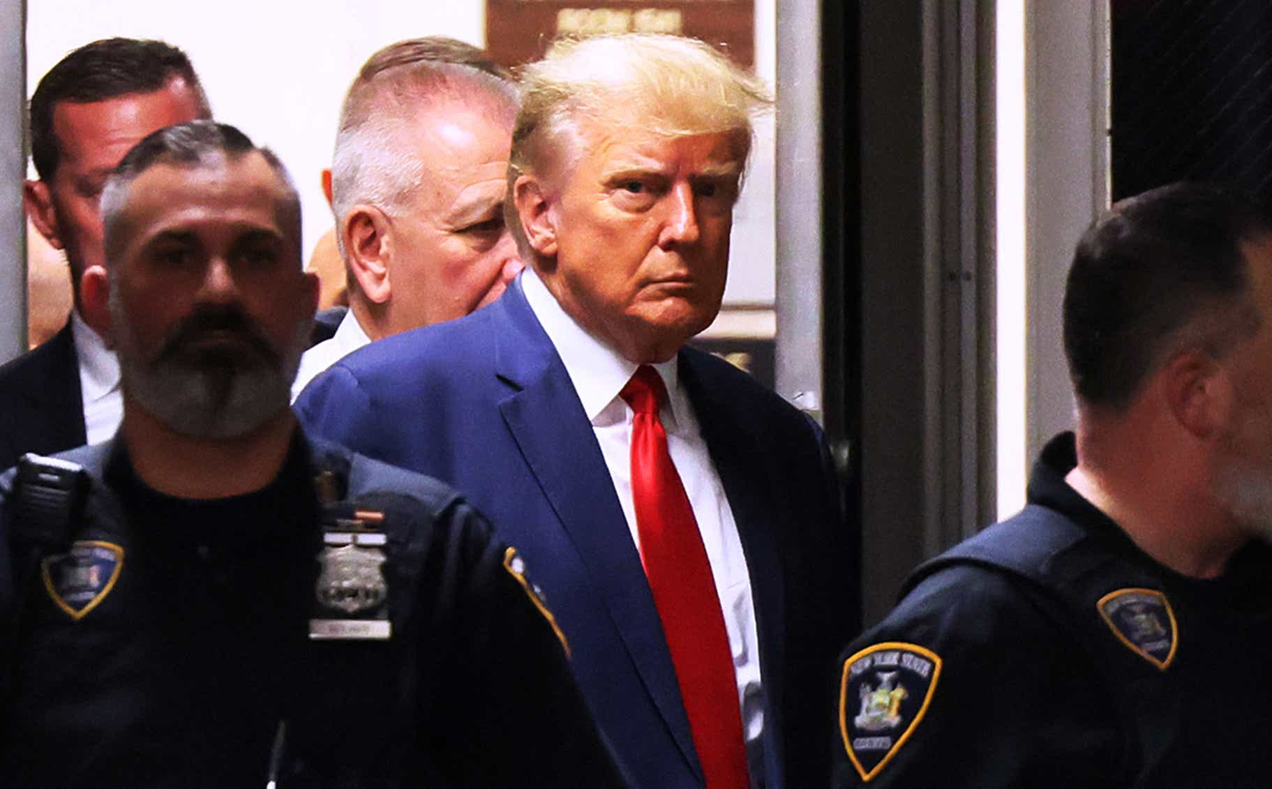 Former U.S. President Donald Trump arrives for his arraignment at Manhattan Criminal Court