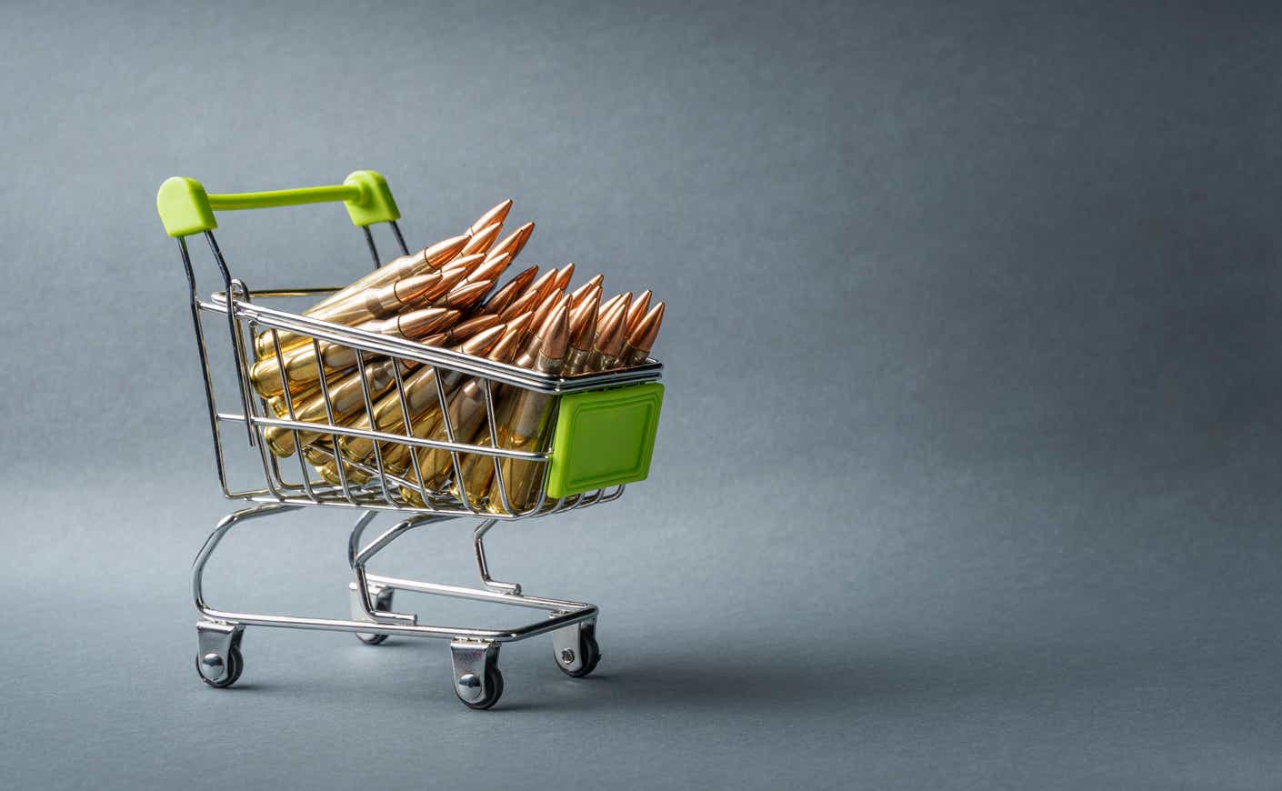 a shopping cart filled with ammunition