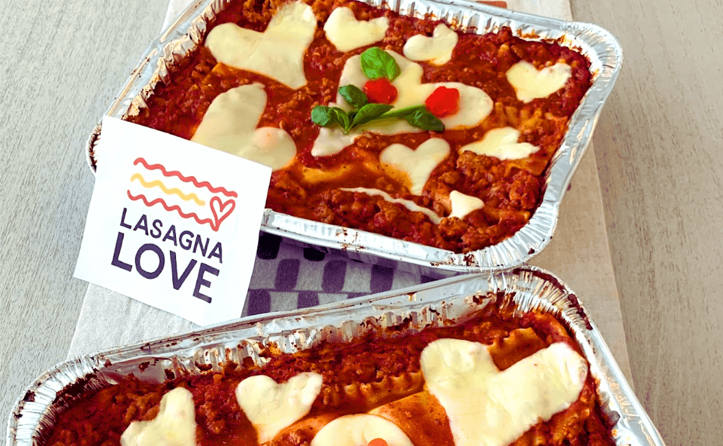 lasagna in pans with hearts on top