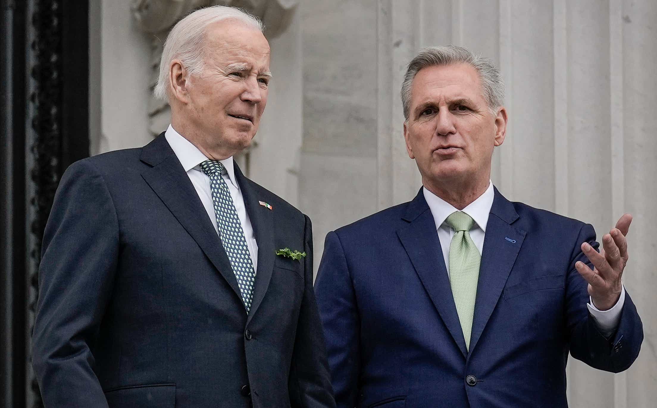 U.S. President Joe Biden and Speaker of the House Kevin McCarthy (R-CA) talk as they depart the U.S. Capitol