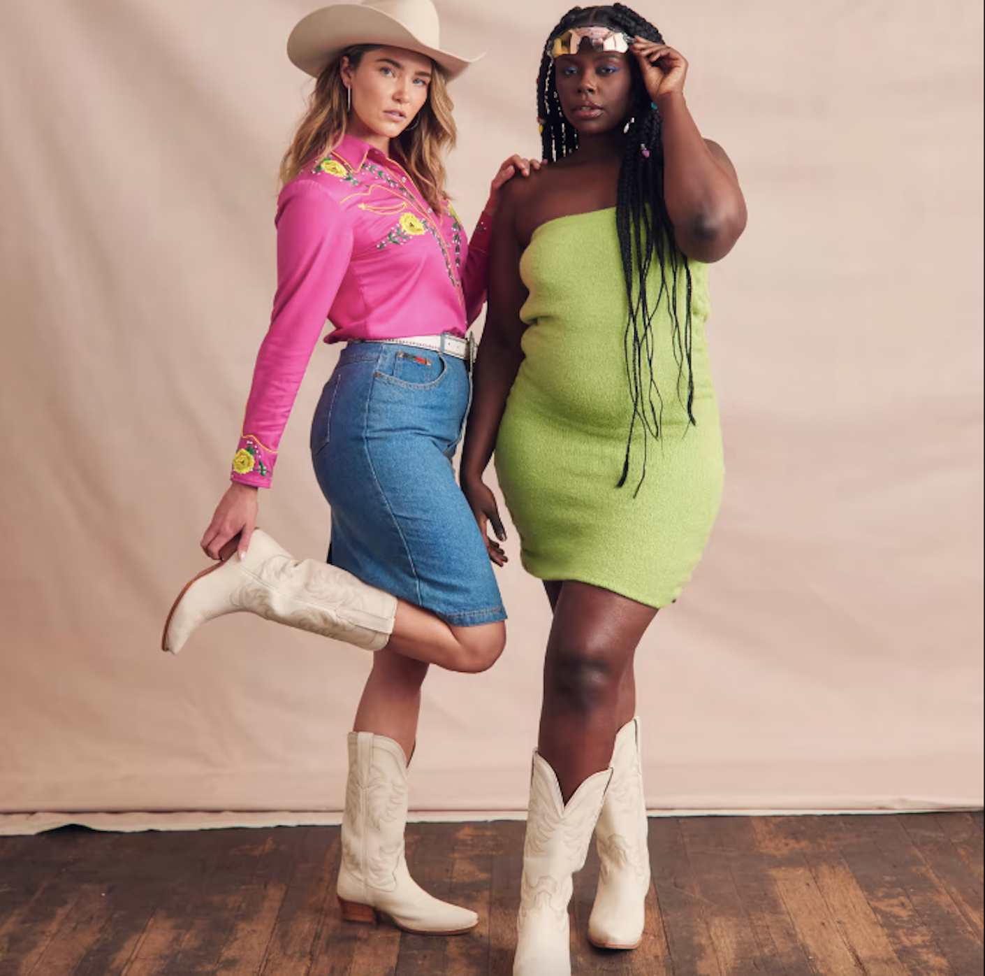 Two women wear white cowboy boots