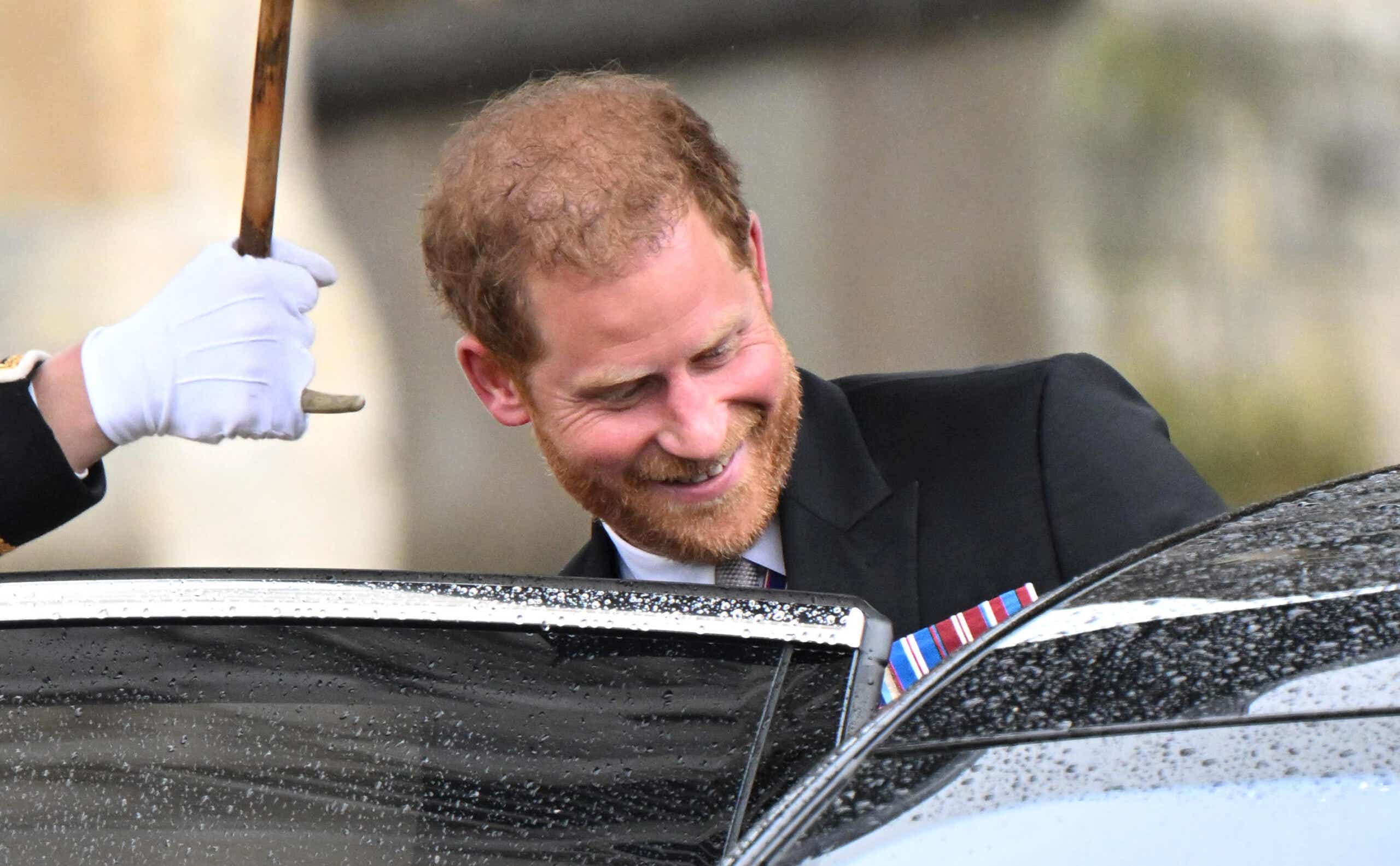 Prince Harry gets into a car