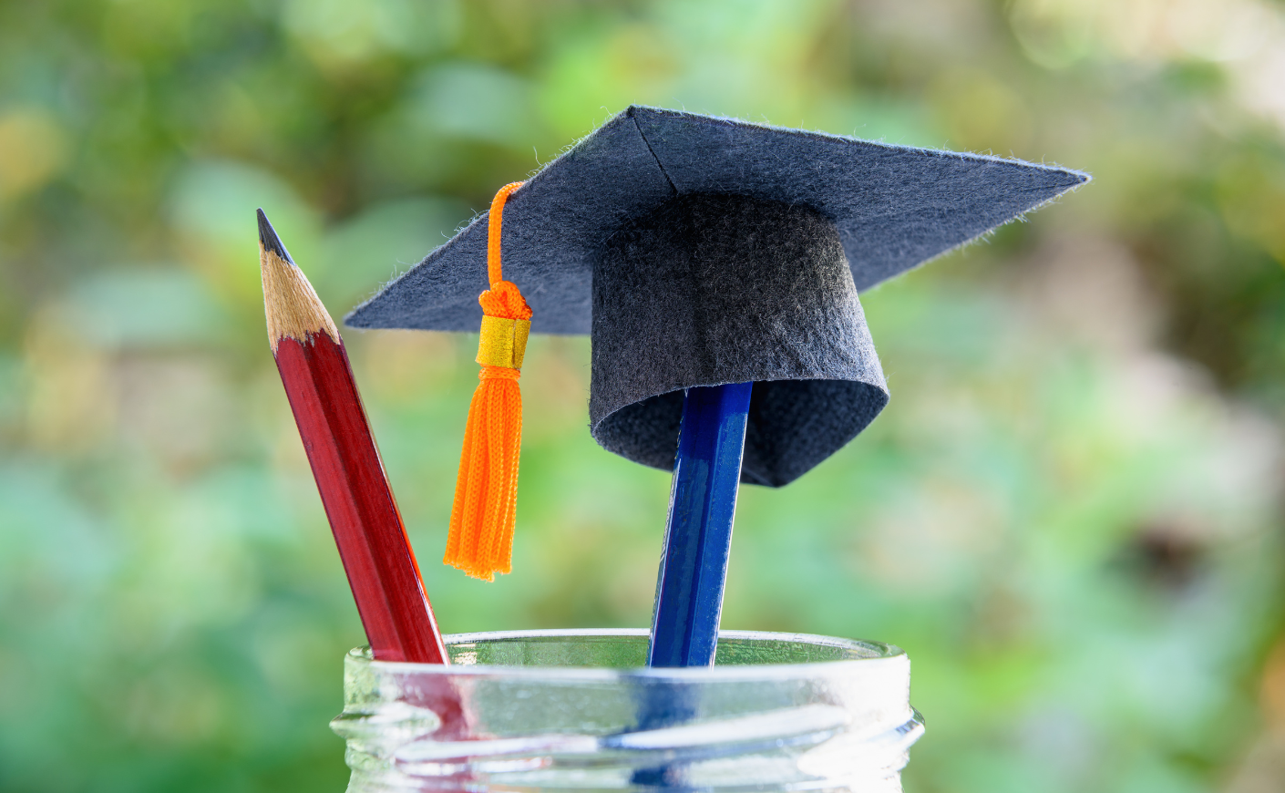 College graduation hat on the top of a pencil