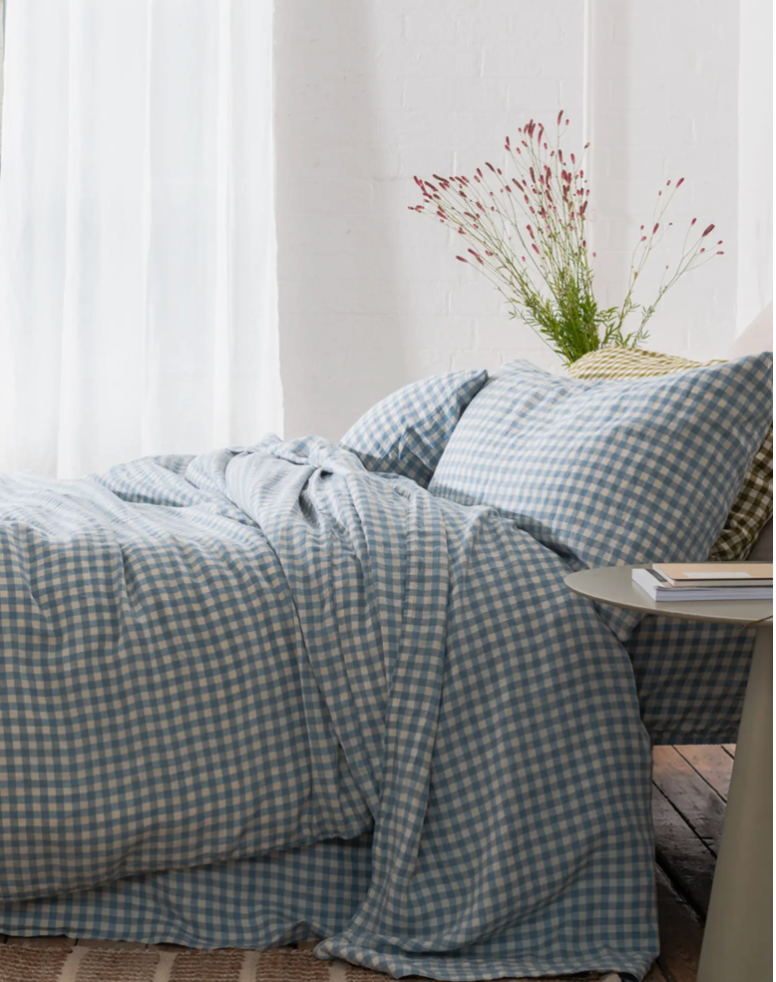 bedroom with blue gingham bedspread