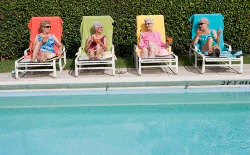 older ladies sitting by a pool
