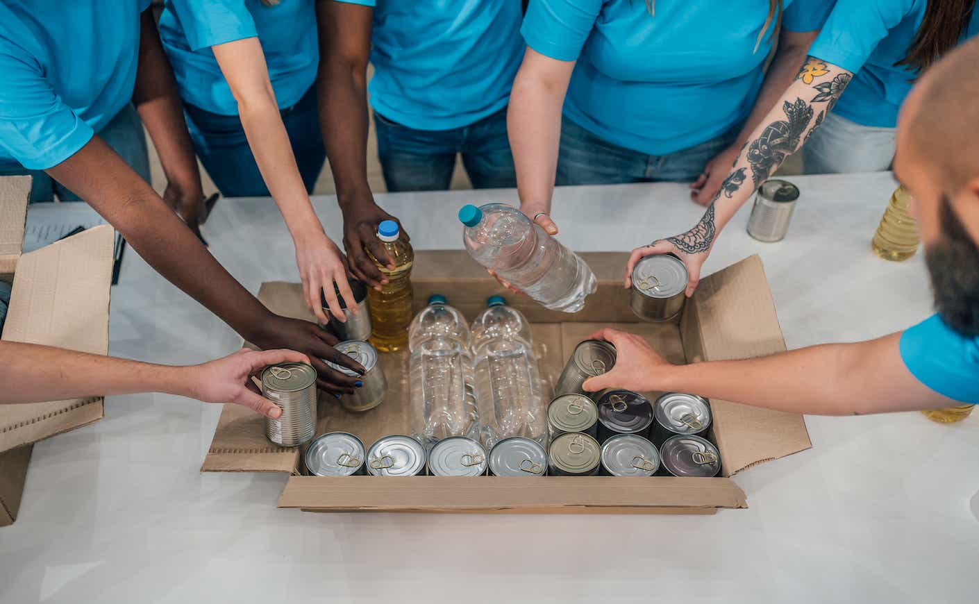 Volunteers packing food