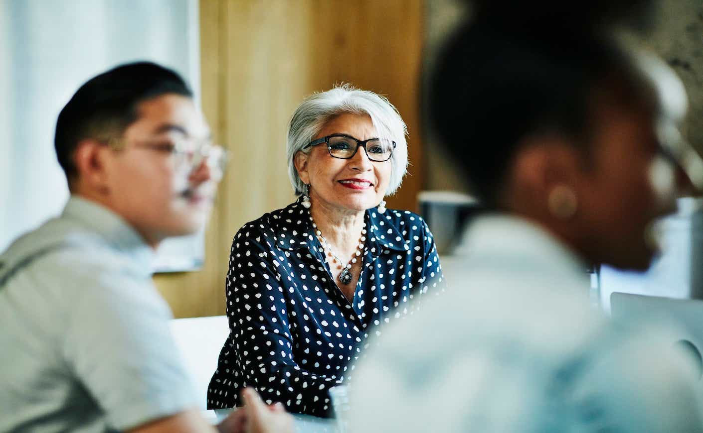 older woman in meeting