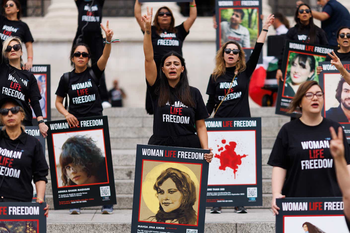 Protestors Carry Portraits Of Iranian Woman Mahsa Amini Through London Ahead Of Anniversary Of Her Death