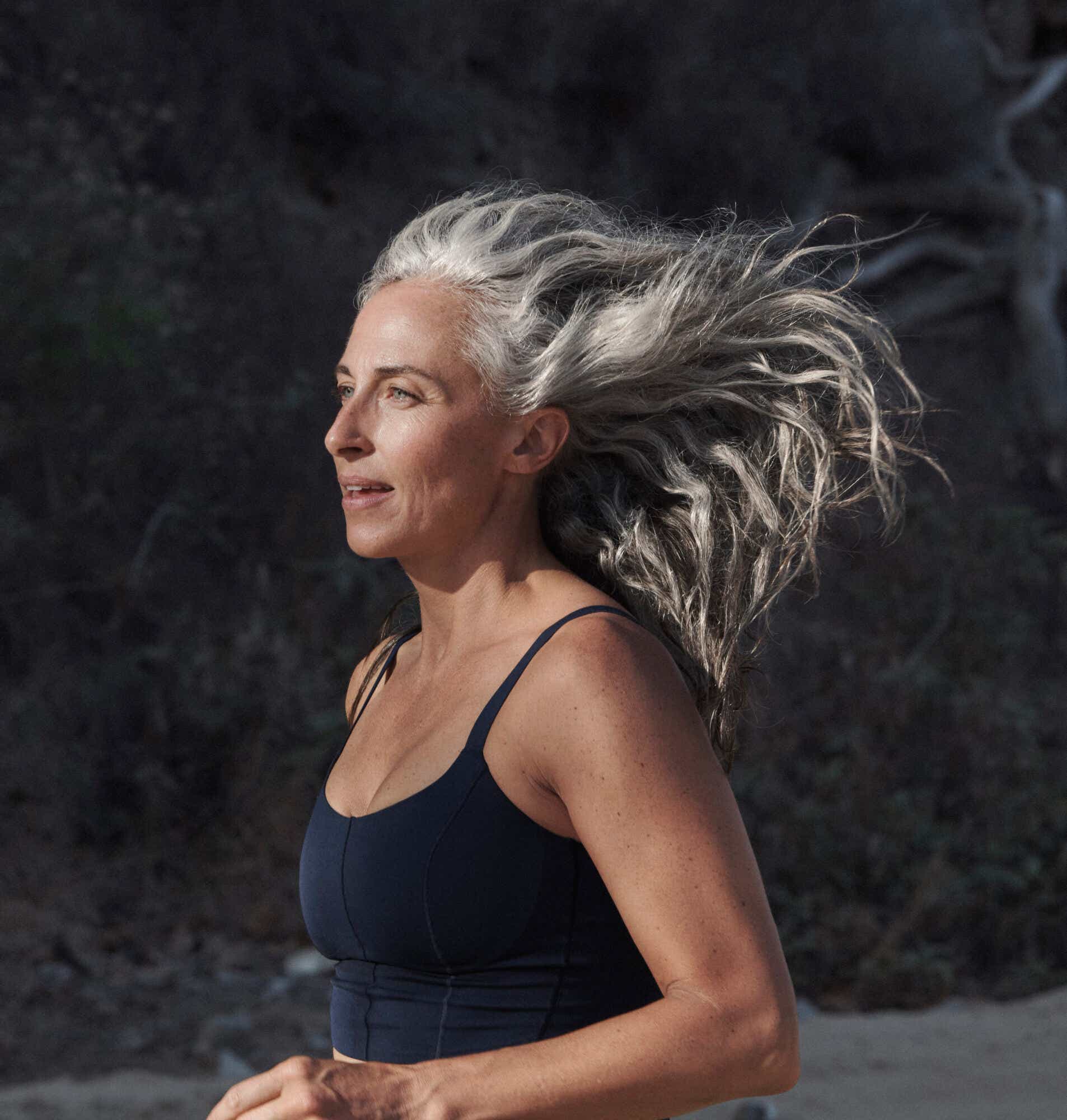 woman running with undone hair