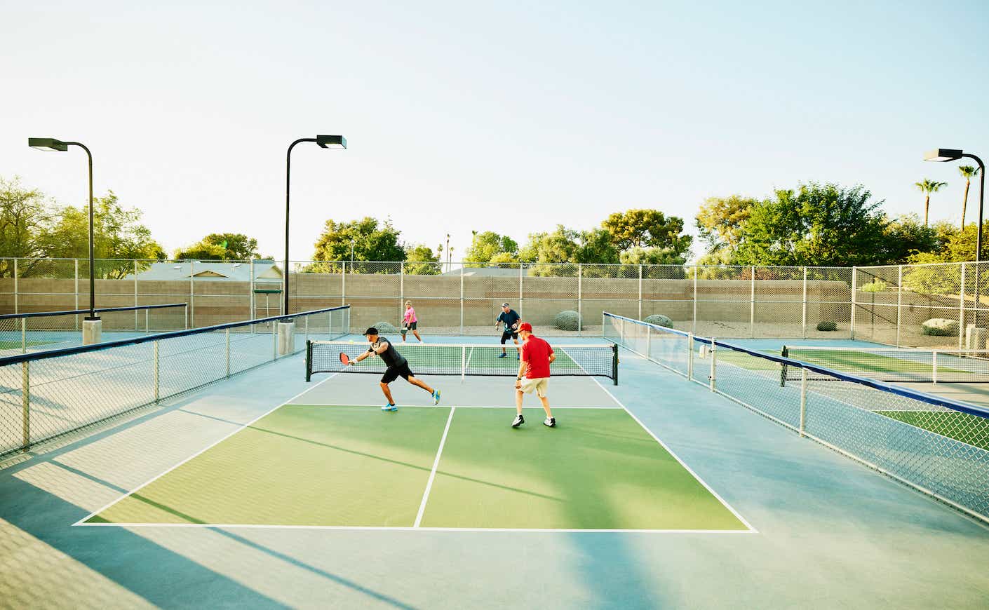 Pickleball players on a court