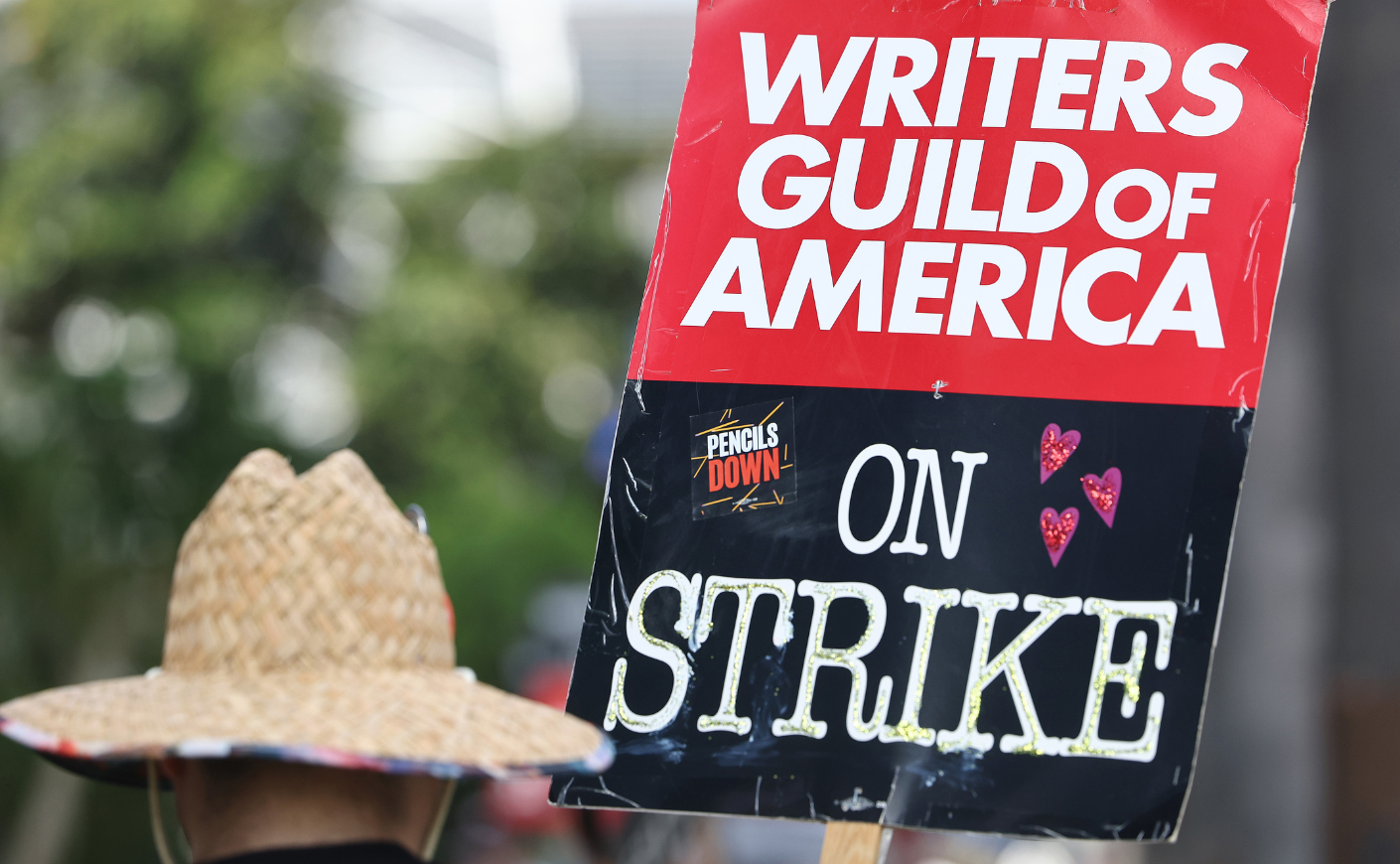 A sign reading "Writers Guild of America on strike"