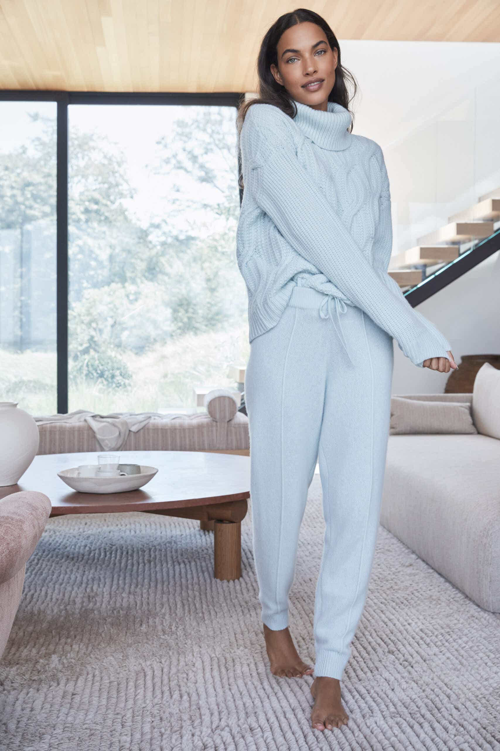 Model wearing Haven Well Within cashmere joggers in sky blue