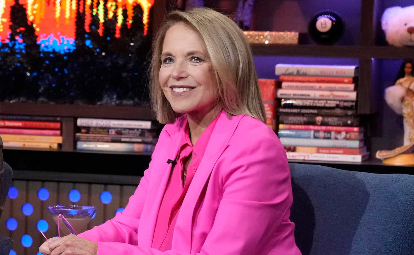 katie couric sitting at the watch what happens live taping