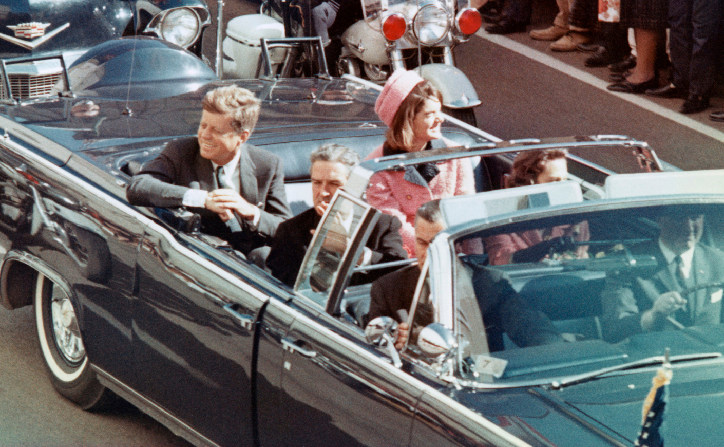 John F Kennedy and Jackie Kennedy in the limousine in Dallas just before his assassination