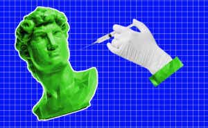 Hand injecting syringe into green statue head on blue checkered background