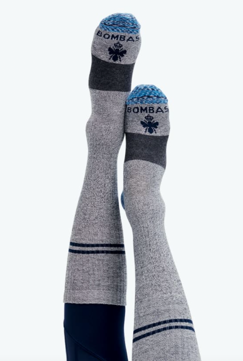 lower legs upside down and wearing Bombas Women's Everyday Compression Socks