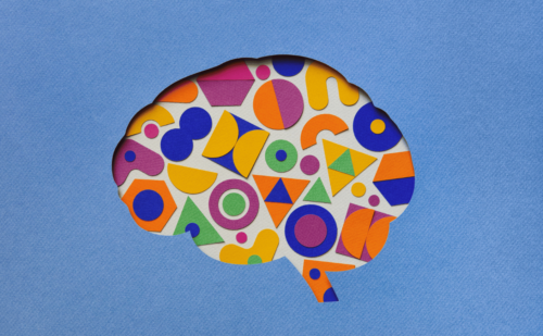 brain with geometric shapes on blue background
