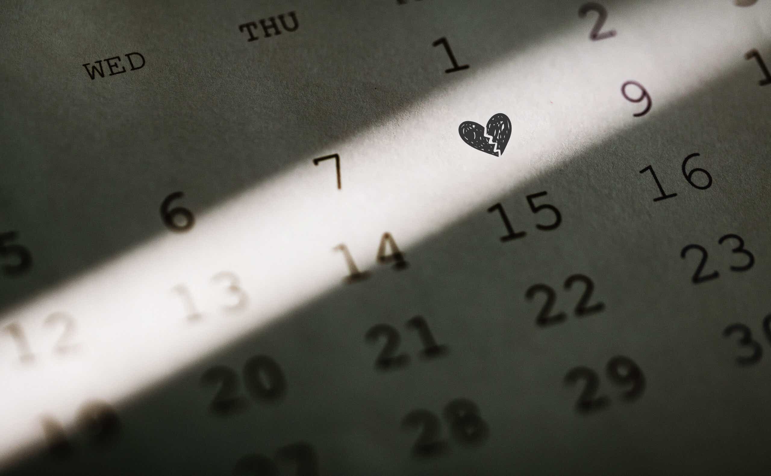 a calendar with a broken heart drawn on one date