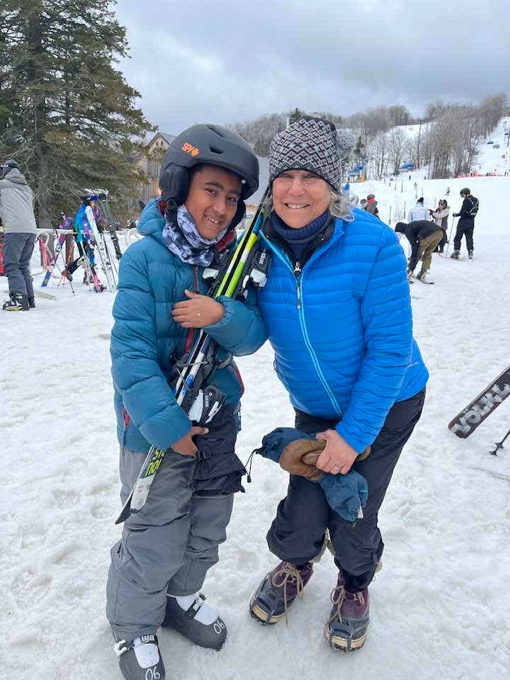 grandson and grandma skiing