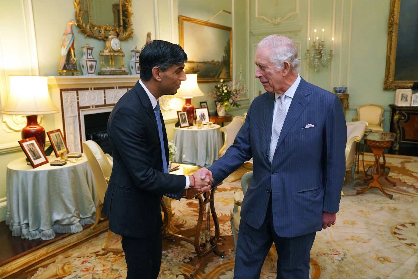 King Charles III with Prime Minister Rishi Sunak at Buckingham Palace, London, for their first in-person audience since the King's diagnosis with cancer.