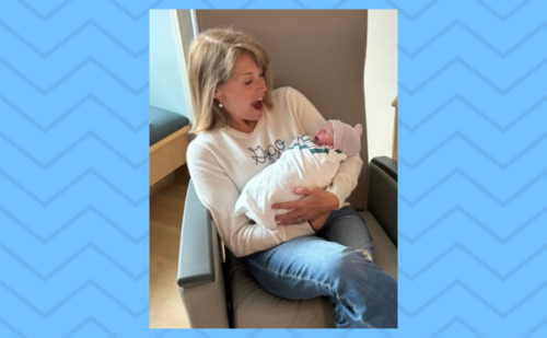 Katie Couric holds baby John