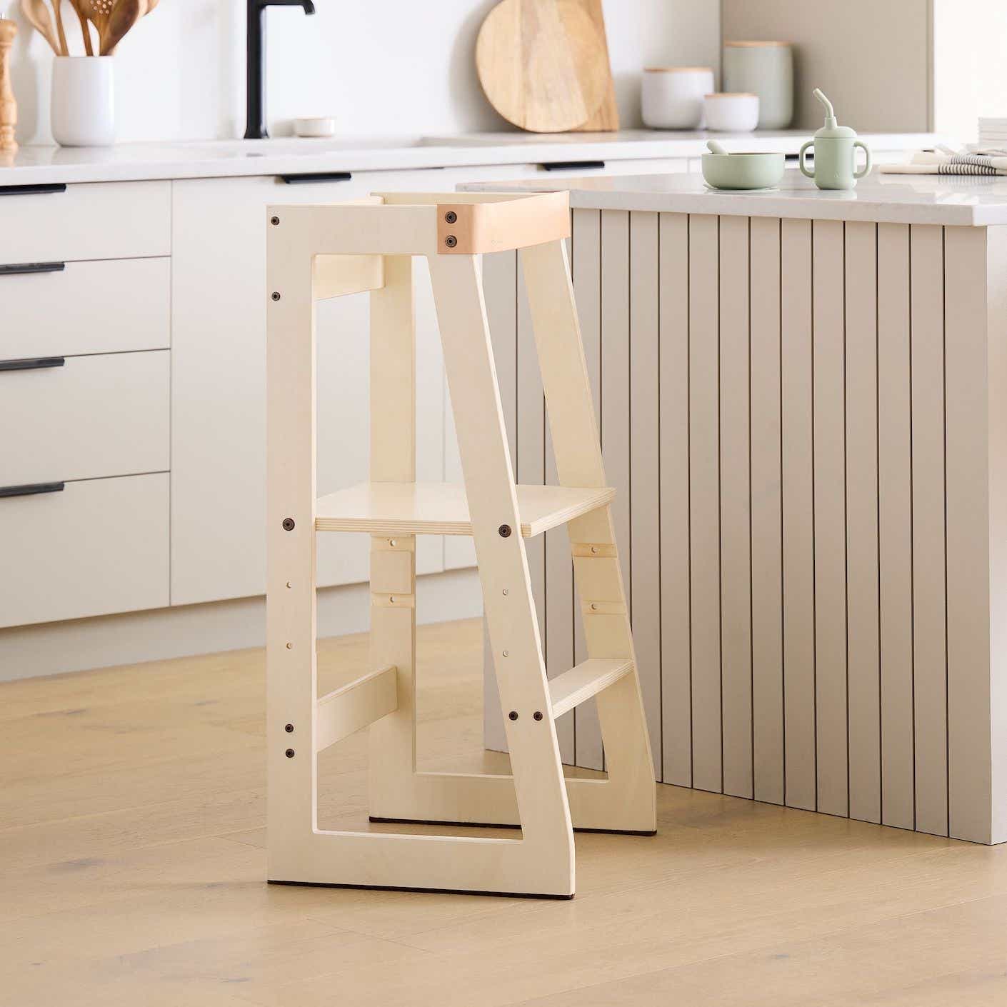A wooden toddler tower
