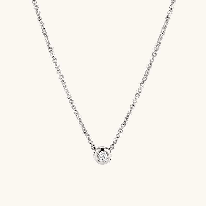 silver neckalce with small diamond