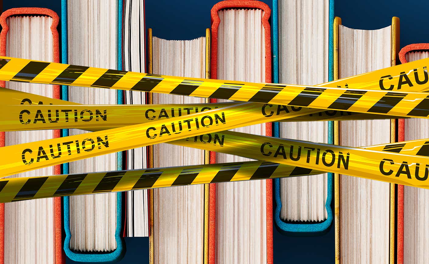 a row of books with caution tape on them