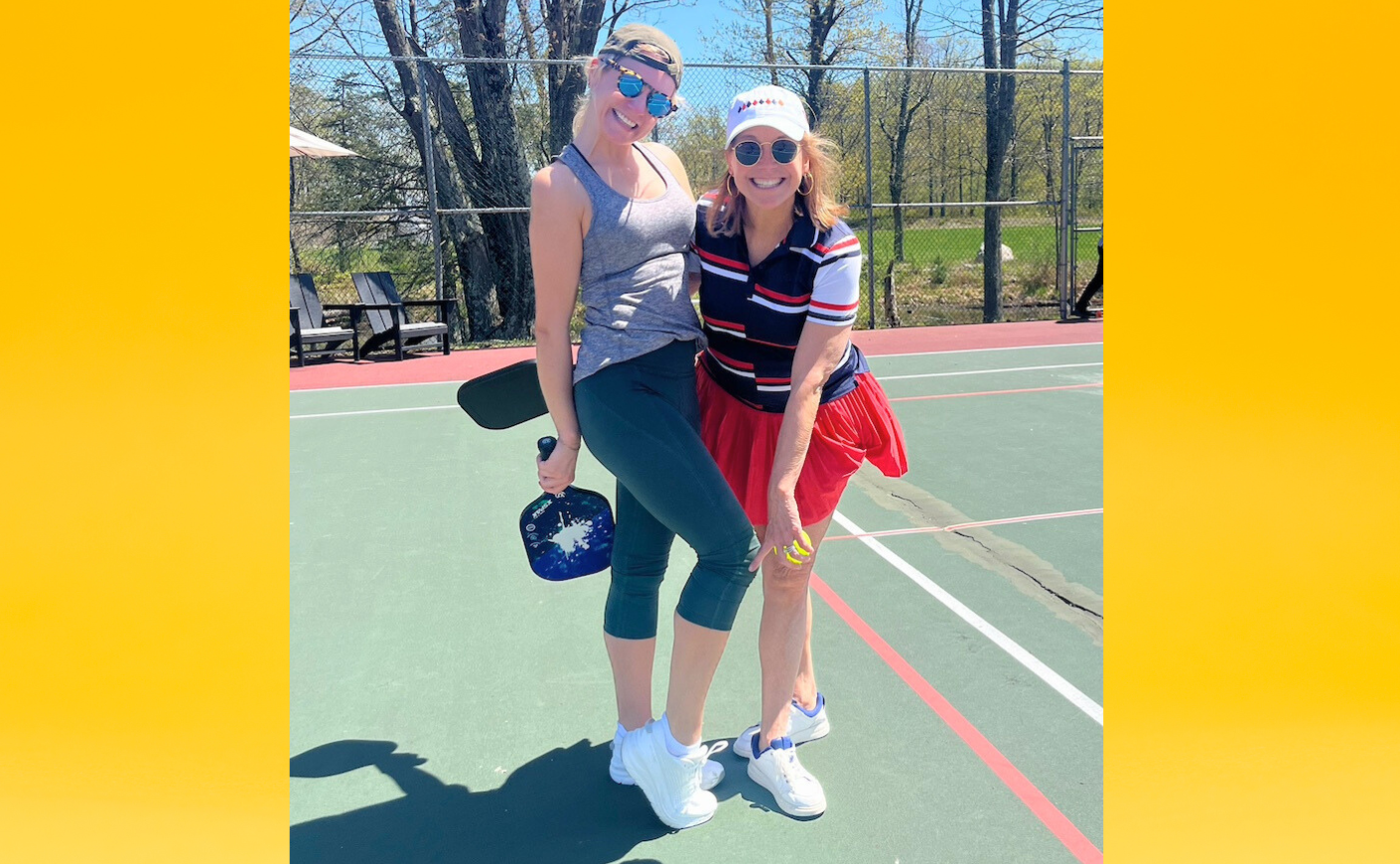 two women on a pickleball court