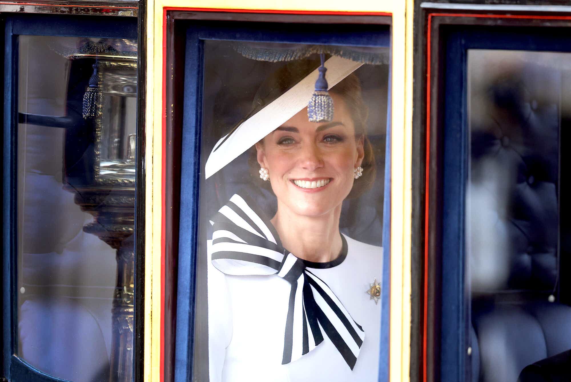 Catherine, Princess of Wales smiles as she travels by carriage during Trooping the Colour at Buckingham Palace on June 15, 2024 in London, England