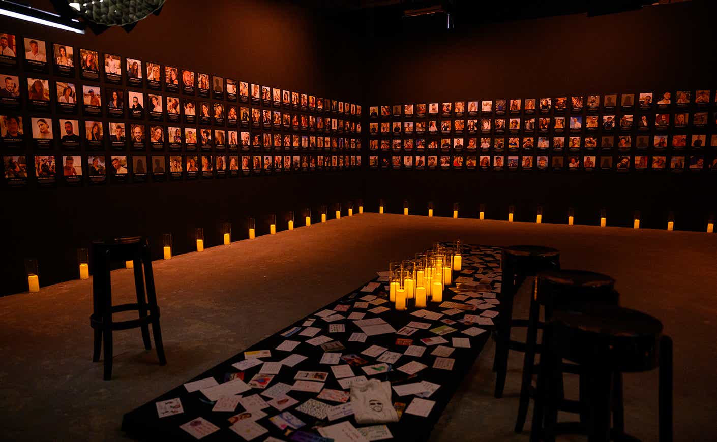 The names and faces of people killed during the Nova festival are displayed at "The Nova Music Festival Exhibition