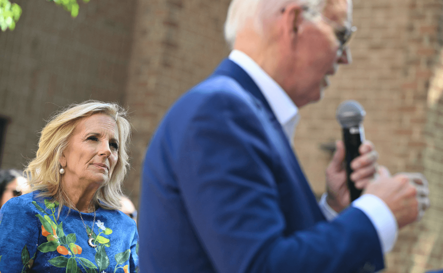 Jill Biden looking at Joe Biden during a speech