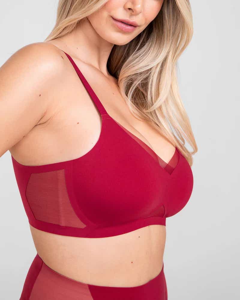 blonde woman wearing maroon bra and matching underwear
