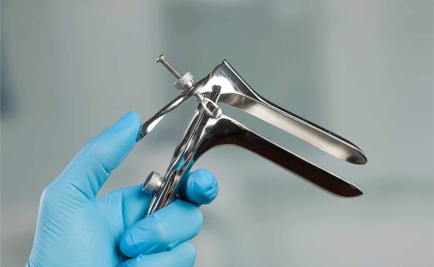 doctor holding a speculum