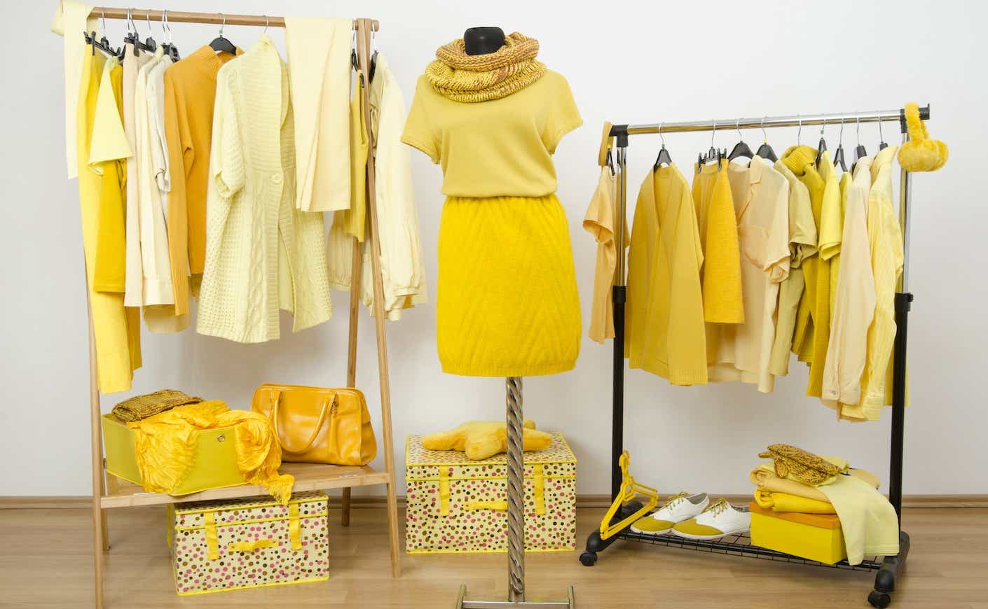 racks of clothing all in different shades of yellow