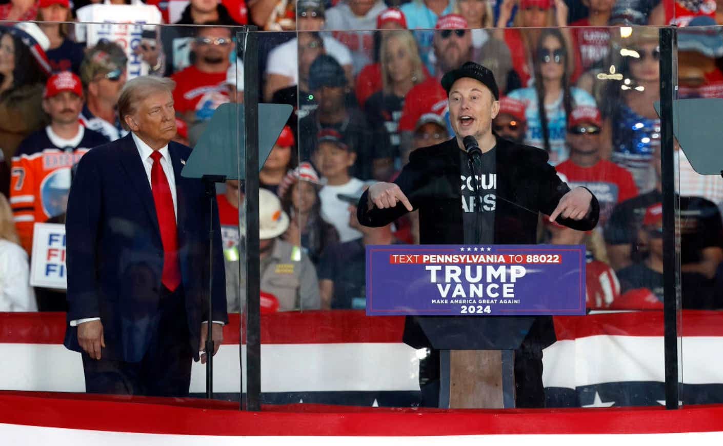 Elon Musk onstage at a Donald Trump rally